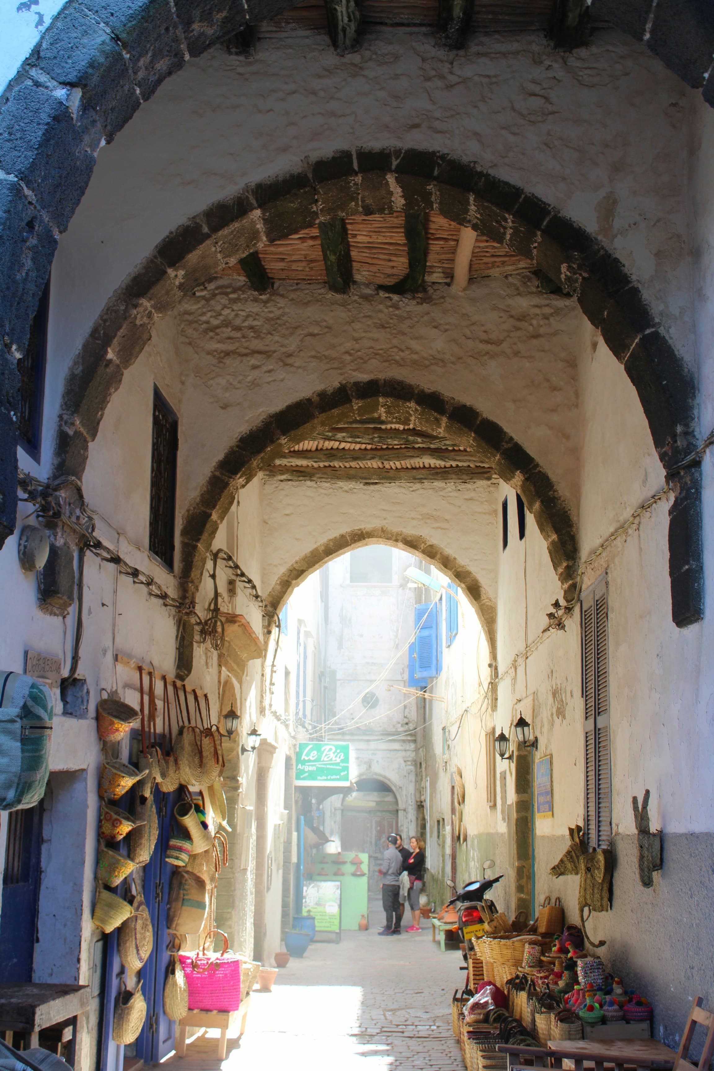 Arched passageway and basket shops in a Moroccan medina — Fes travel guide